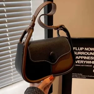 KHARIDLE Elegance Noir Saddle Sling Bag